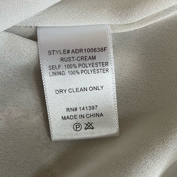 FLORET STUDIOS | Cold Shoulder Asymmetric Ruffle Dress In Rust-Cream | Size XS - Picture 9 of 10